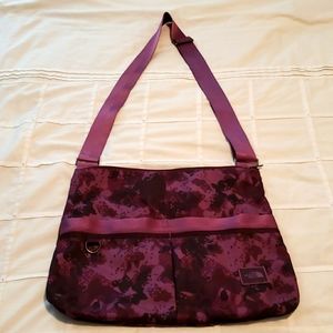 The North Face purple crossbody bag